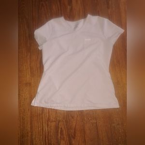 Medium three pocket Jaanuu Scrub Top. Option to bundle medium Joggers